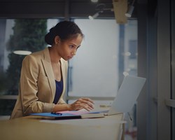 Professional working on laptop