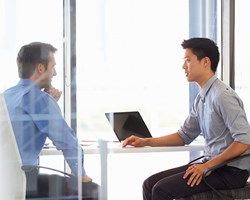 Two professionals having a meeting