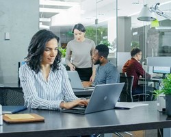 Female infront of Laptop