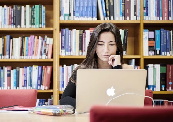 Female student studying in library