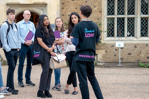 Prospective students on a guided tour around campus