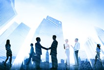 Silhouette of Law professionals shaking hands