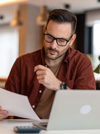 Male reading a document