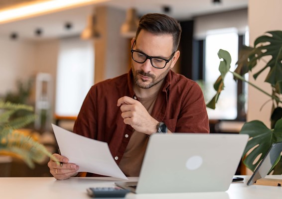 Male reading a document