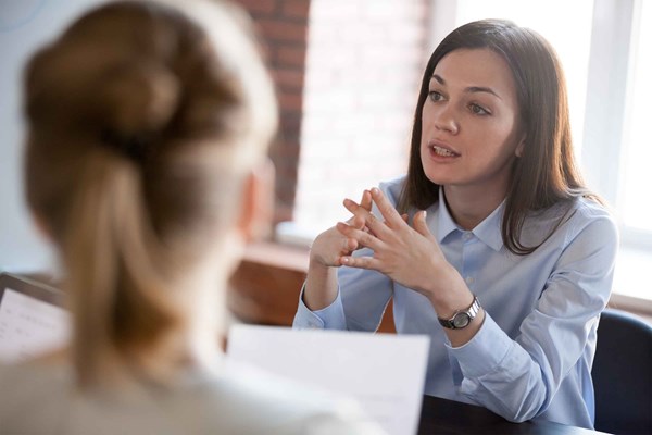 Woman talking with others