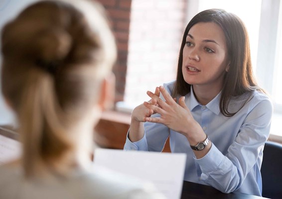 Woman talking with others