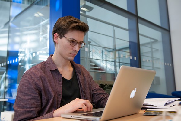 Student working on a laptop