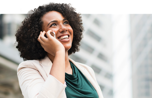 Woman on the phone smiling 